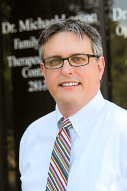 Dr. Michael E. Larson